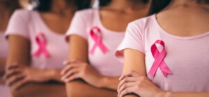 women promoting breast cancer awareness